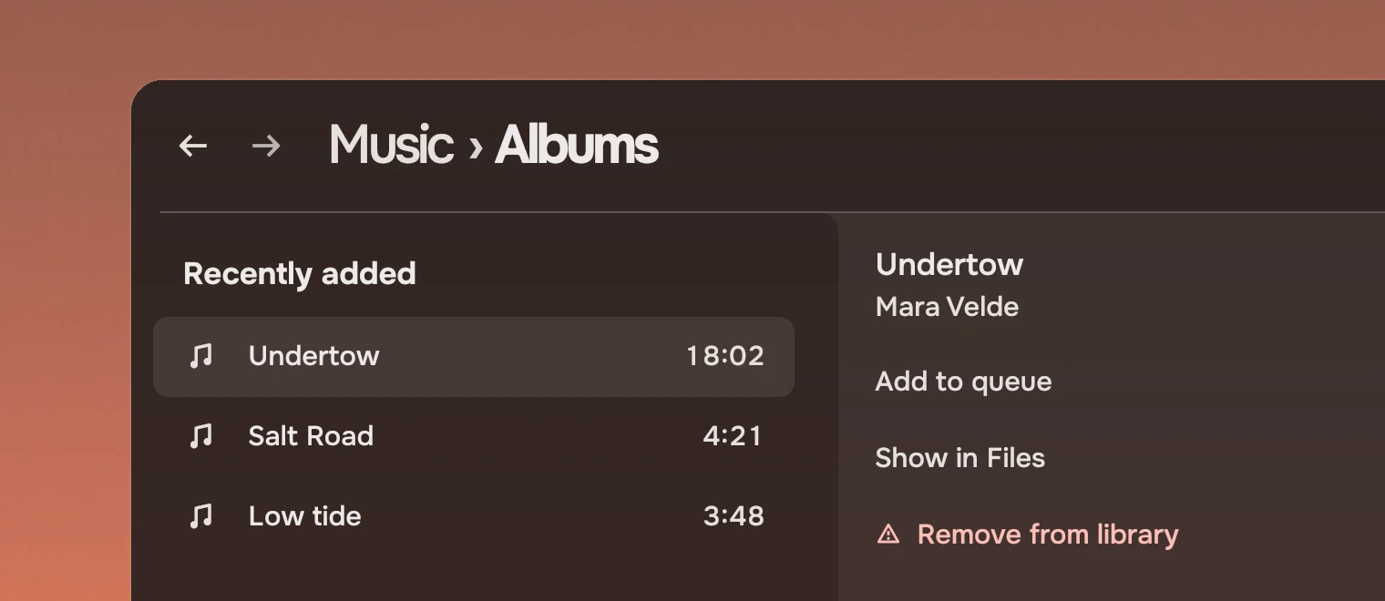Part of a Music window with a list of songs and a docked panel for the selected one, Undertow by Mara Velde, with the actions Add to queue, Show in Files and, last, Remove from library with the warning symbol.
