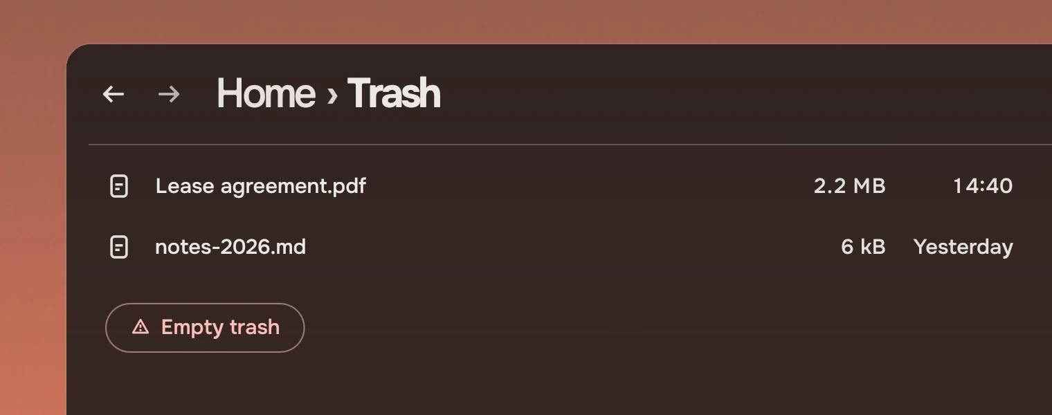 A Files window headed Home, Trash, with two files. Under the list sits a risk Slab, Empty trash.