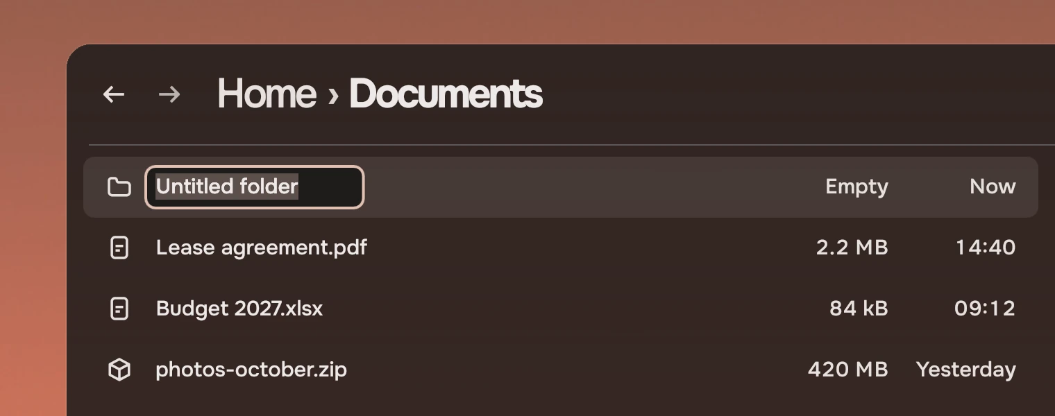 A Files window headed Home, Documents. The first row is a folder named Untitled folder with all of its name chosen, in a box with an accent ring, above three files.