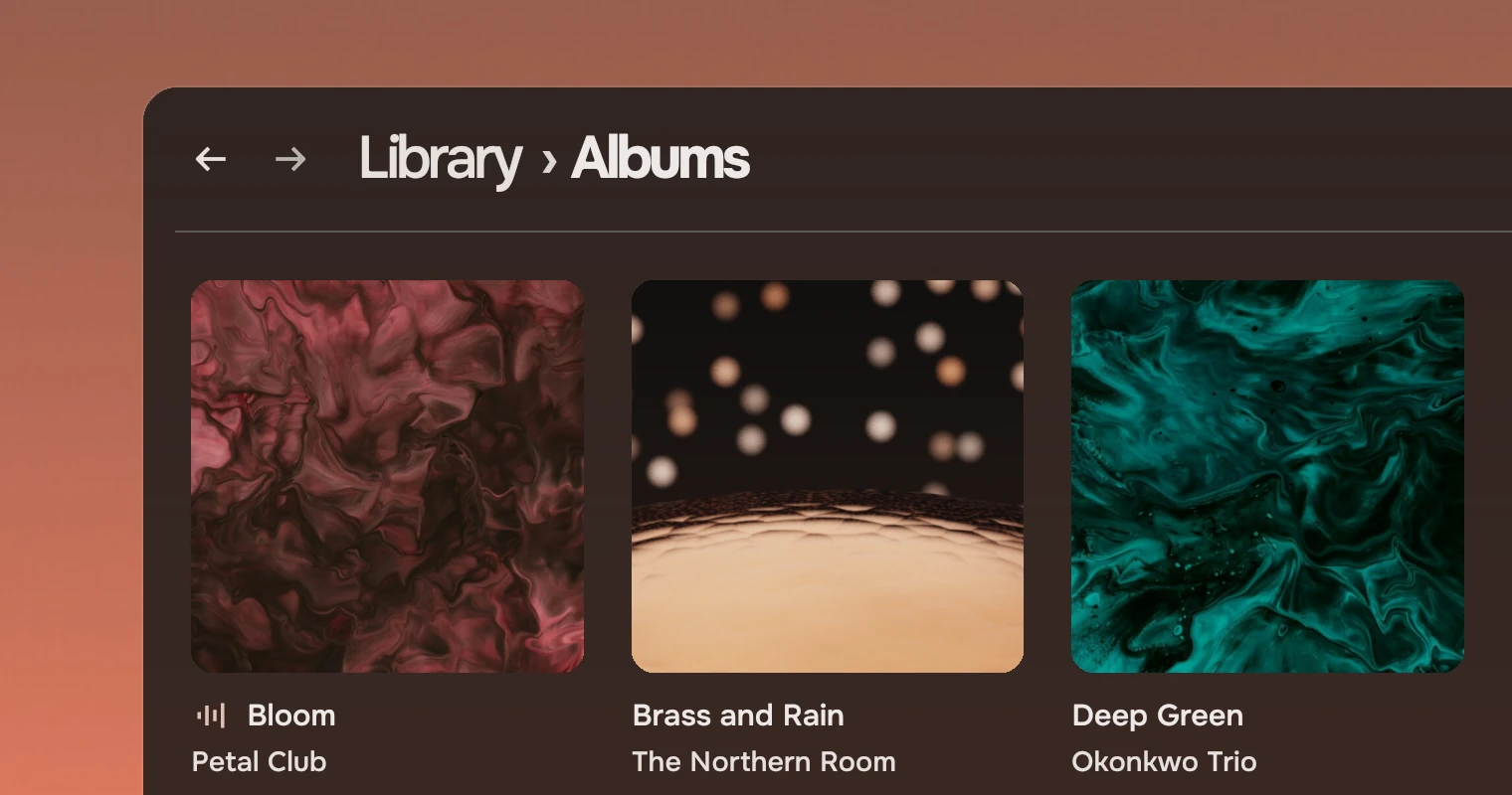 Part of the Music window on its Albums page: a header and a grid of album covers, the first with the mark for the album that is playing, each with the album's name and the artist under it, and a second row starting below.