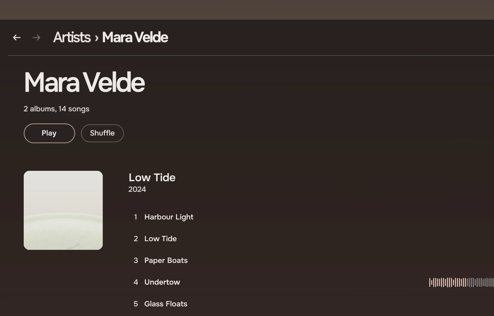 The page for Mara Velde: the name at display size, 2 albums, 14 songs, Play and Shuffle, then the album Low Tide with its cover and ten song rows, the fourth showing the playing mark and a waveform.