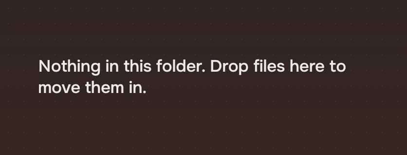 A page state in the corner where the first row would start: Nothing in this folder. Drop files here to move them in.