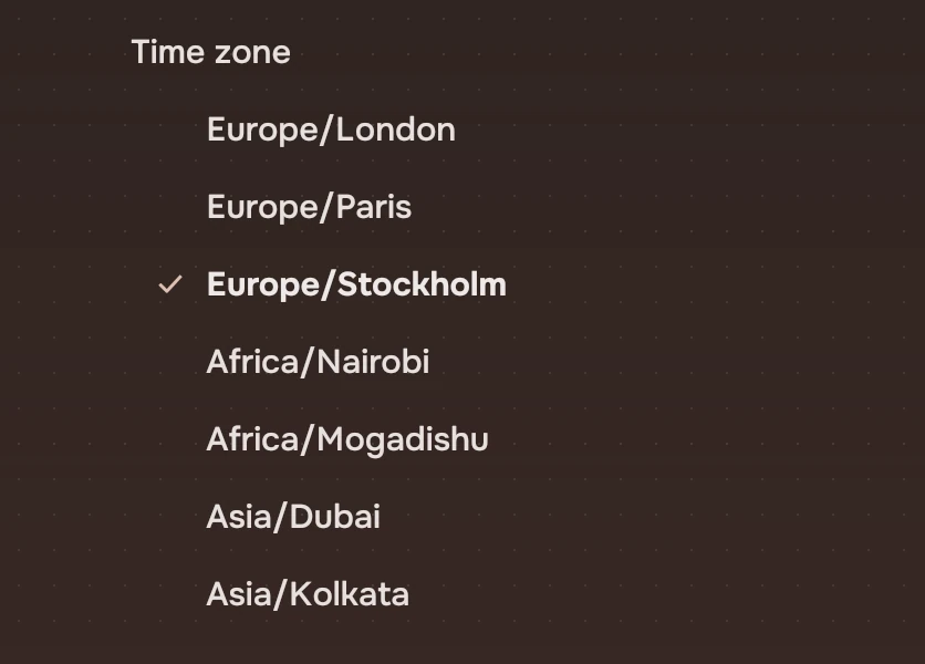 The label Time zone above seven choices, from Europe/London to Asia/Kolkata.