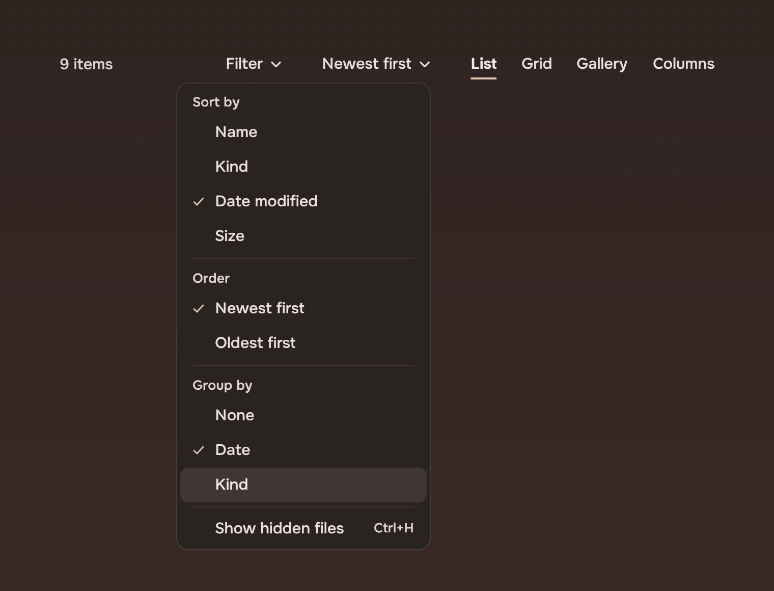 The order menu of a view bar open below the order, with the groups Sort by, Order and Group by, each with its own heading and one line ticked, and last Show hidden files with its key Ctrl+H.