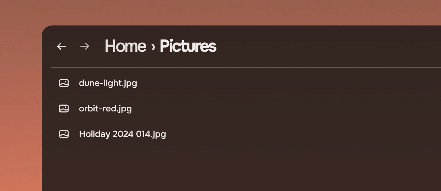 The top-left corner of a window on the wallpaper, headed Home, Pictures, with three rows. The window's dark ground is a little see-through, so the wallpaper's warmth shows in it.